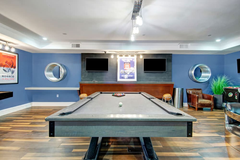 Billiards table and game area inside clubhouse at Bradlee Danvers in Danvers, Massachusetts