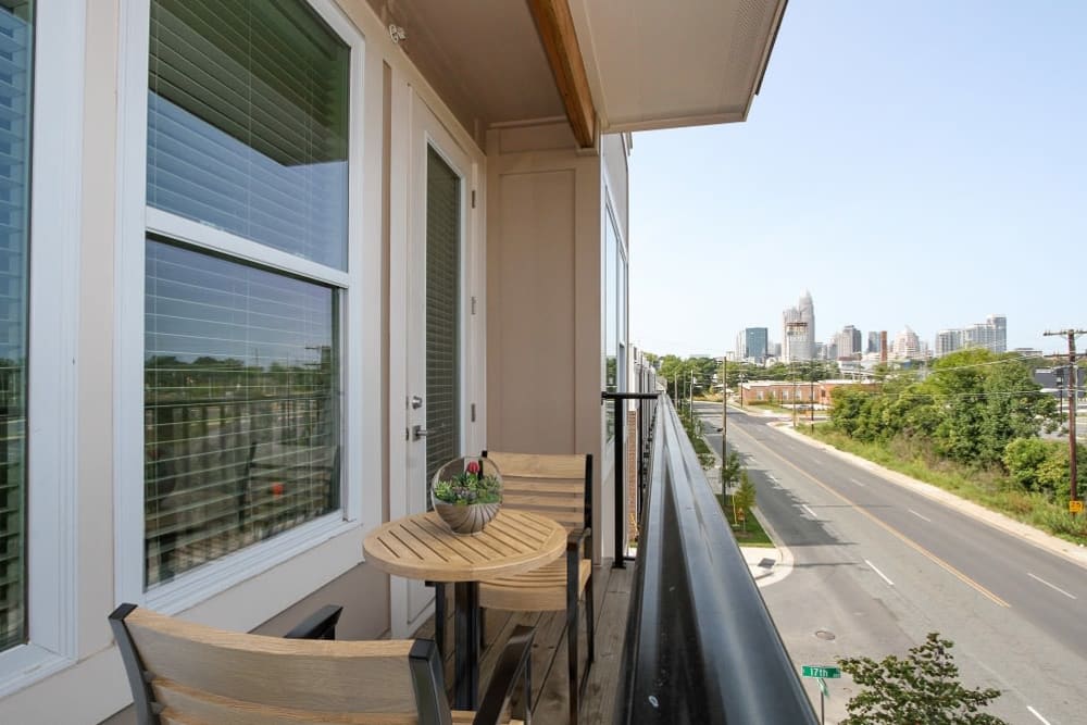 Private balcony with view of skyline at 300 Optimist Park in Charlotte, North Carolina