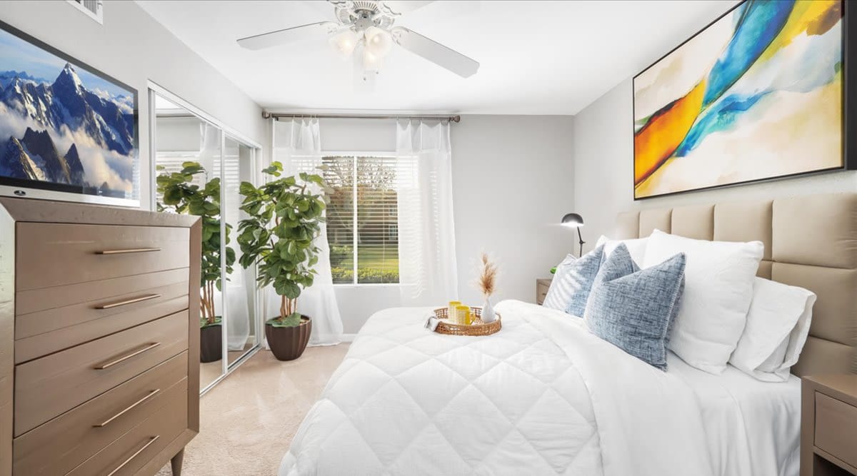 Bright bedroom at  Mirabella Apartments in Bermuda Dunes, California