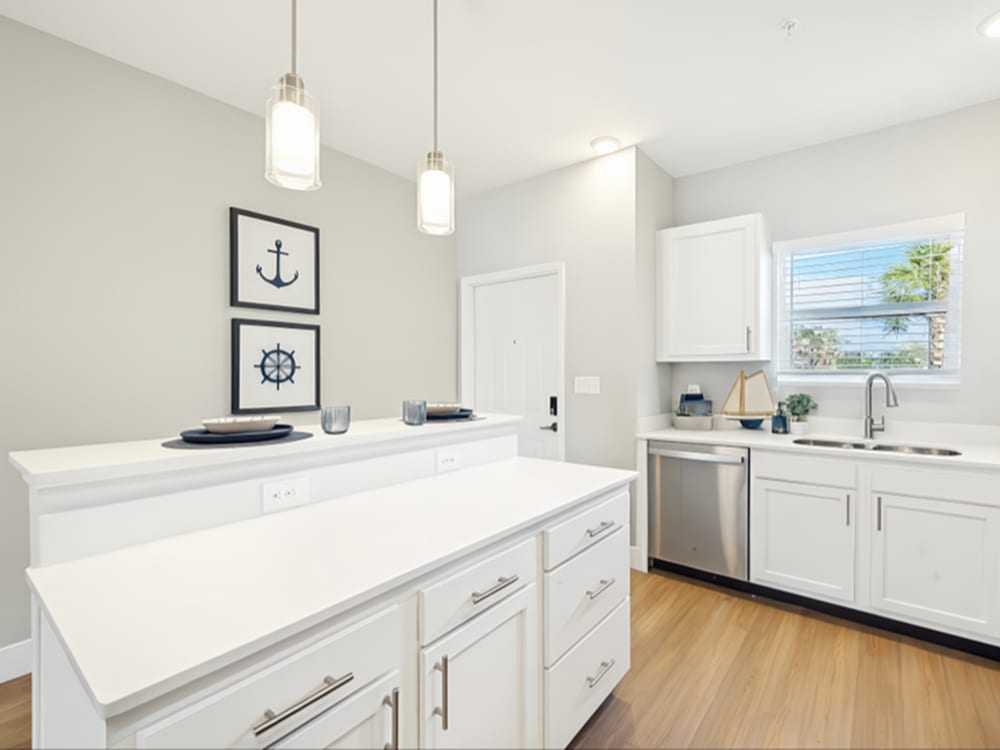 Modern kitchen with stainless-steel appliances at Viva At Palm Coast in Palm Coast, Florida 