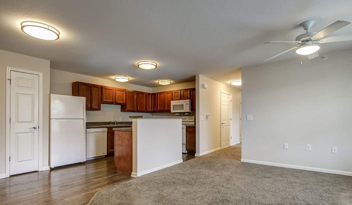 Bright living room with connecting kitchen at Seaborn Greene in Bamberg, South Carolina