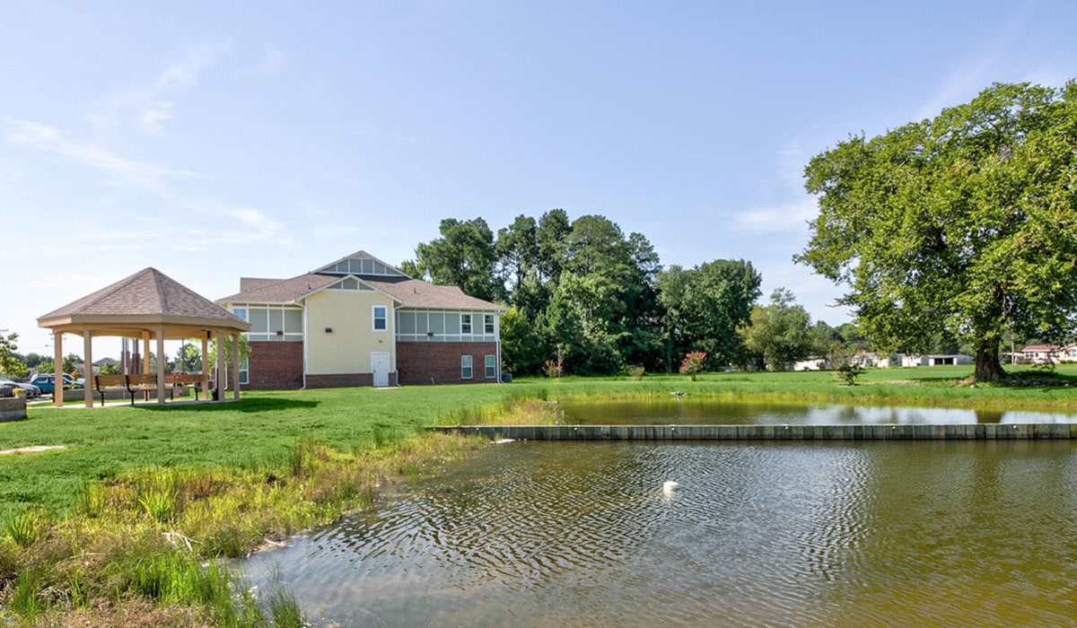 Outdoor lake view near apartments at Tooley Place in Elizabeth City, North Carolina