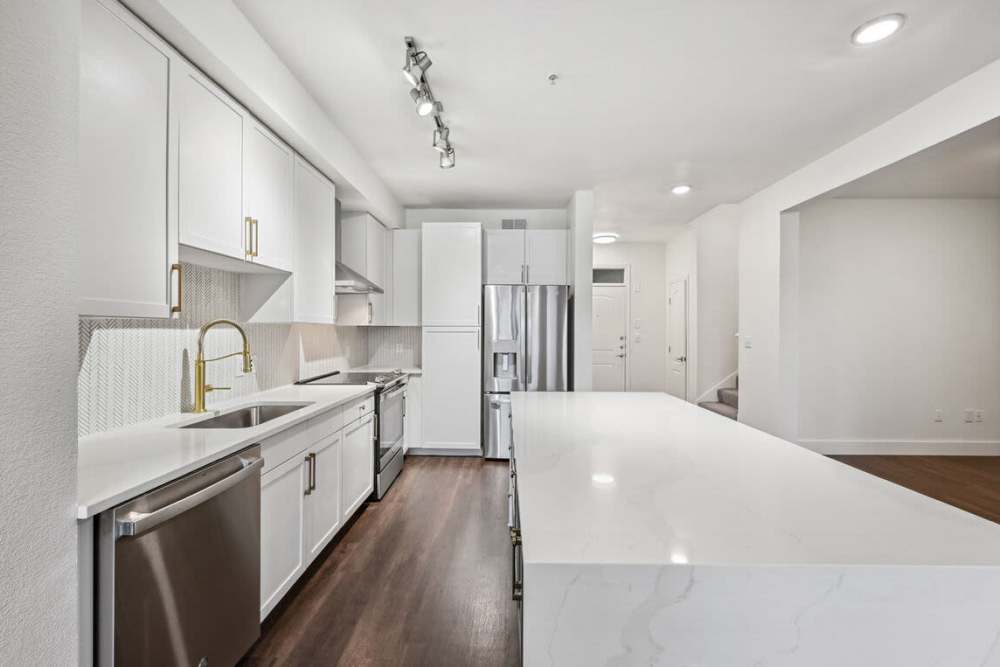 Kitchen island with quartz countertops at Dorian and Encore in Plano, Texas