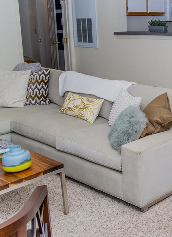 Carpeted living room at Villas at Countryside in Moore, Oklahoma