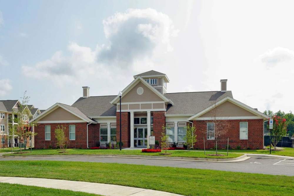 Welcoming community center with modern design and landscaped surroundings at Adams Crossing in Waldorf, Maryland