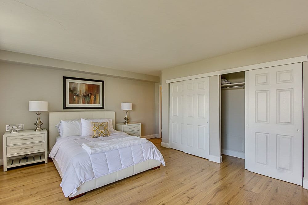 Master bedroom with wood style flooring at Chestnut Hill Tower in Philadelphia, Pennsylvania