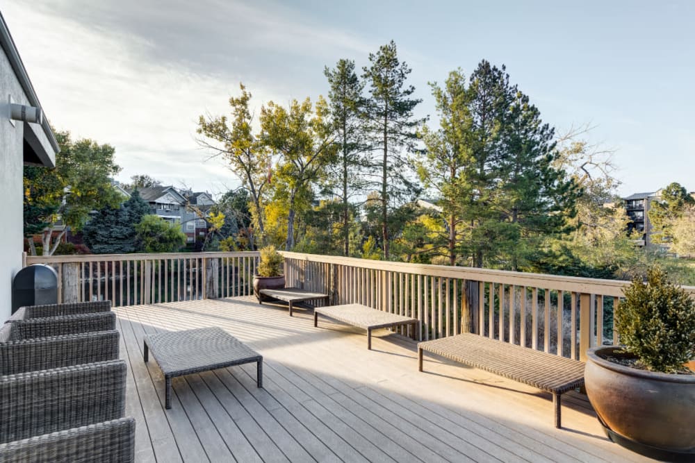 Tranquil seating area with ample seating and lake front views at Ashford Belmar in Lakewood, Colorado