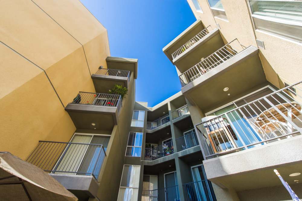 Luxury balconies with plants and furniture at Capri Apartments in Marina Del Rey, California
