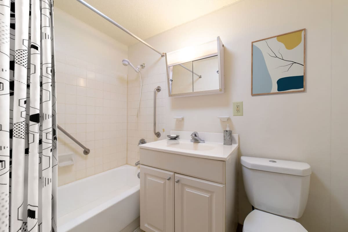 Bright bathroom with shower and tub at Cardinal Medeiros Manor in Dorchester, Massachusetts,