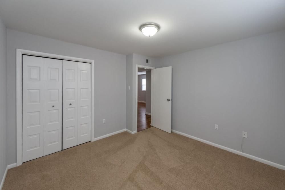 Bedroom with spacious closet at Signal Hill Apartments in Mechanicsville, Virginia