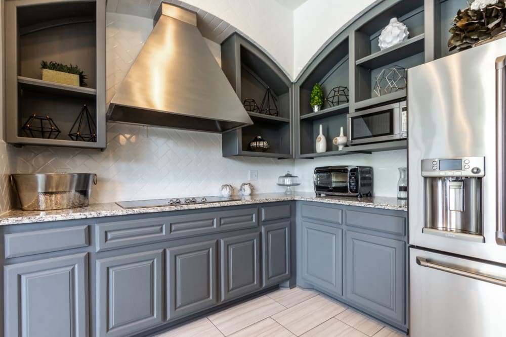 Community clubhouse kitchen at Marquis at Stonegate in Fort Worth, Texas