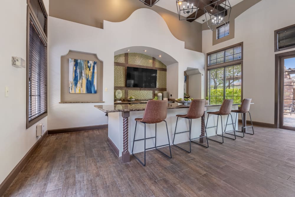 Community clubhouse kitchen and dining area at Marquis at Sonoran Preserve in Phoenix, Arizona