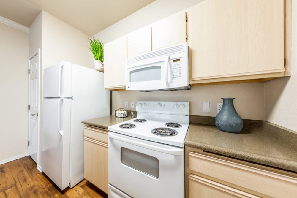 Kitchen with granite counters at The Fairmont at Willow Creek in Folsom, California