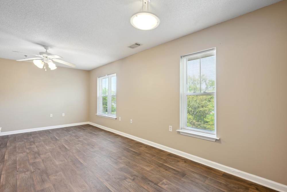 Bedroom with windows at Fellwood I in Savannah, Georgia