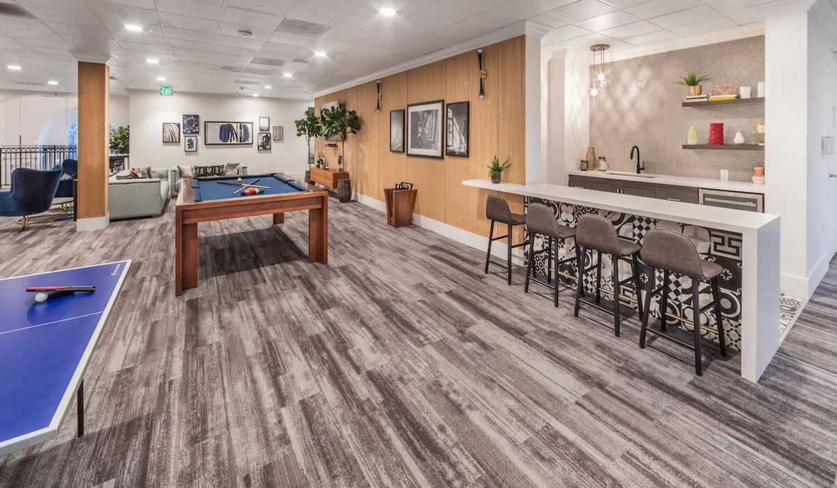 Clubhouse with kitchen and play area at Plaza at Sherman Oaks in Sherman Oaks, California