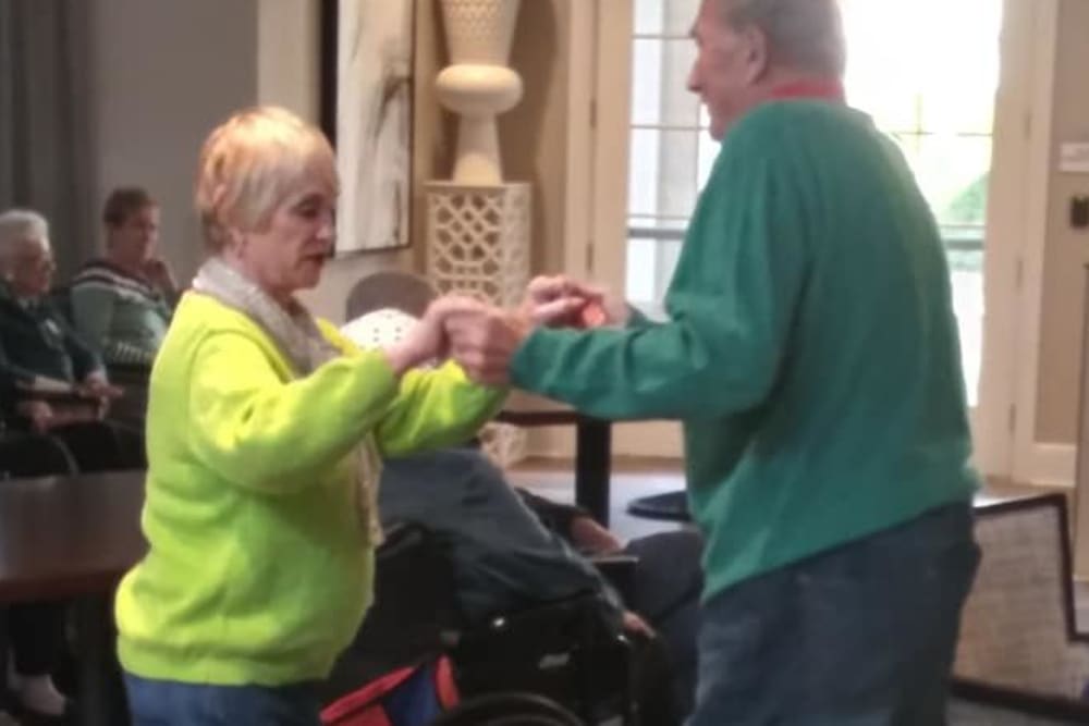 Senior Couple dancing to entertainment at Blossom Ridge in Oakland Charter Township, Michigan