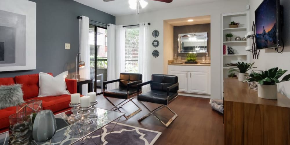 Cozy living room with porch access at Circle at Point Park in Houston, Texas