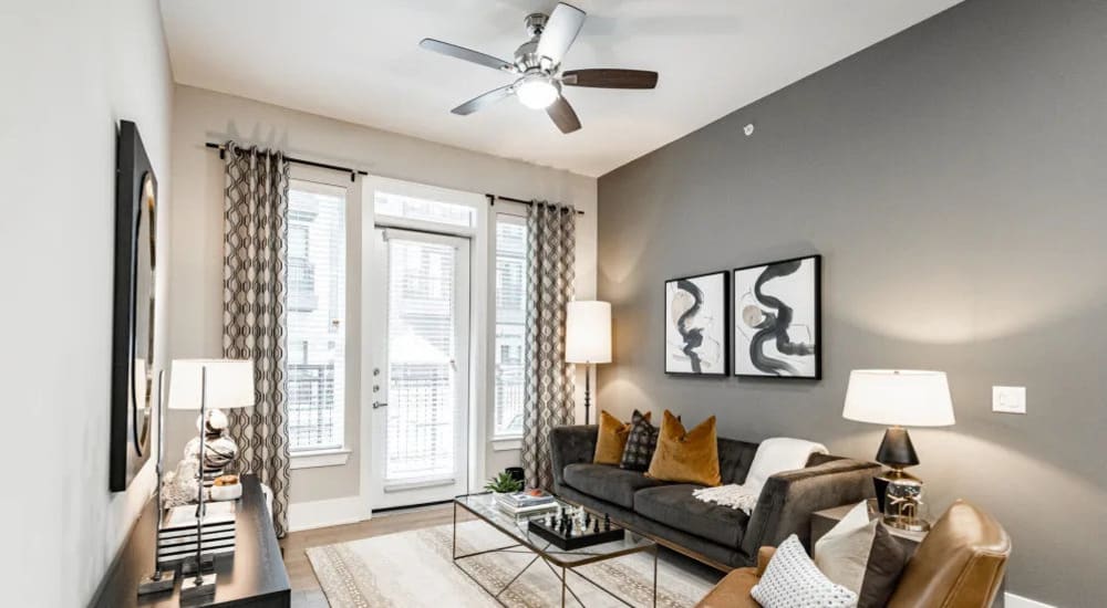 Tall ceilings in an apartment living room at The Register in Richardson, Texas