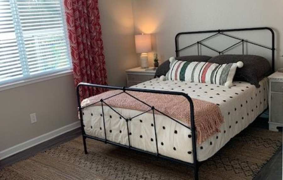 Modern bedroom at Cotton Wood Apartments in Dublin, California