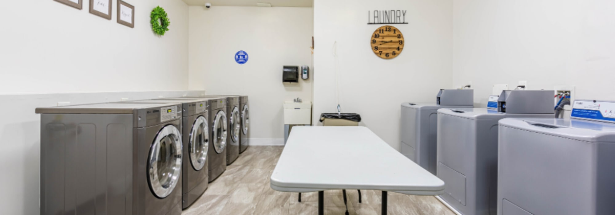 The community laundry room at Grand Meridia Apartments in Rahway, New Jersey