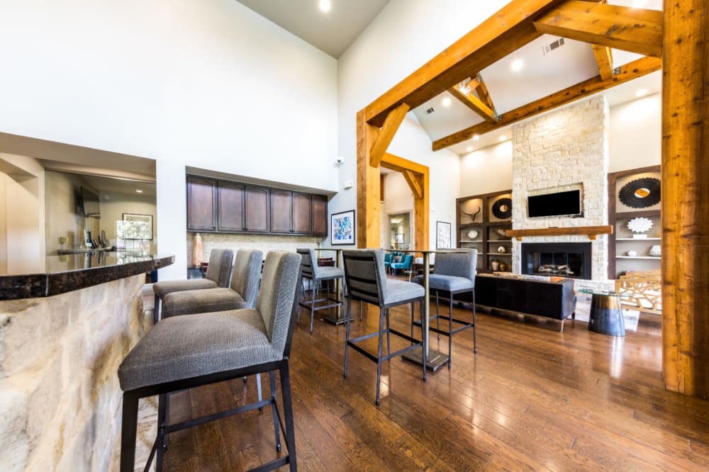 Community clubhouse kitchen and dining area at Marquis at Sugar Land in Sugar Land, Texas
