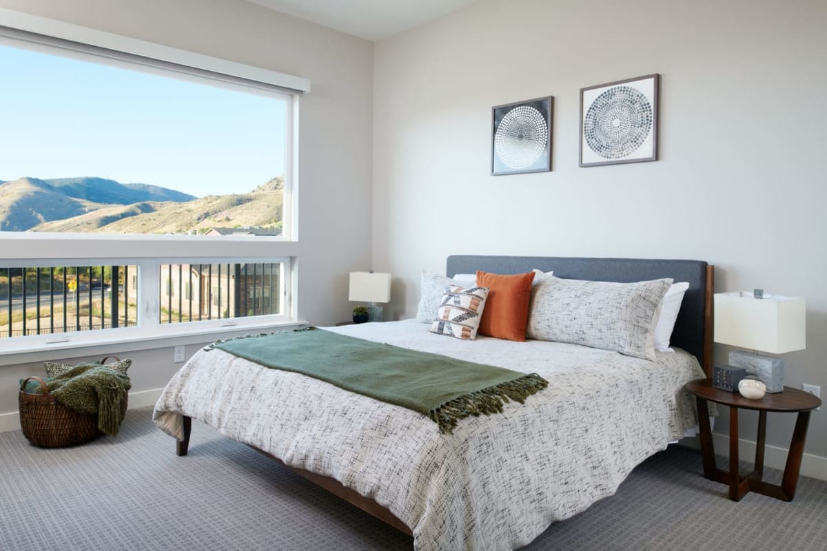 Apartment bedroom with mountain views at Epoque in Golden, Colorado