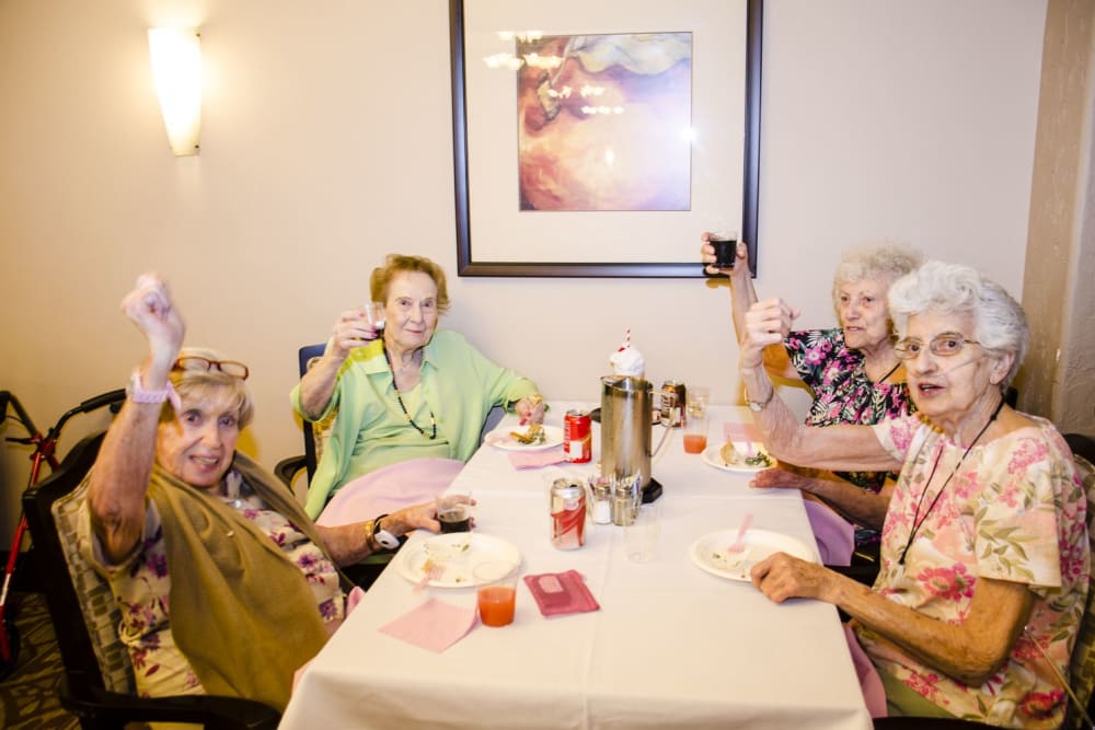 Resident friends having fun at Merrill Gardens at Green Valley Ranch in Henderson, Nevada. 