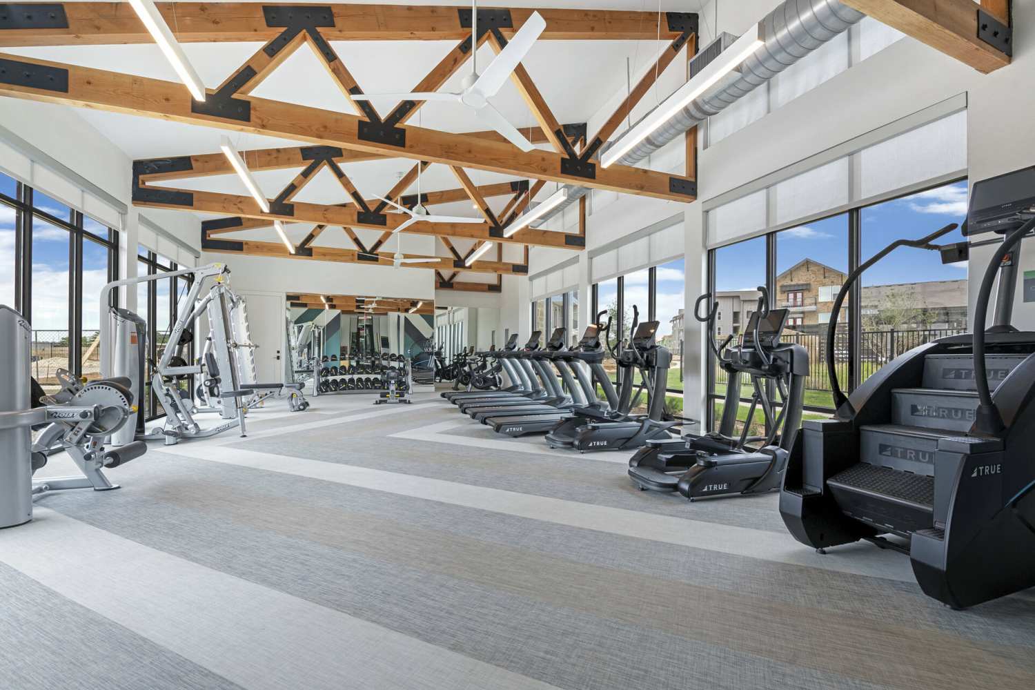Well-equipped community fitness center at Slide North Apartments in Lubbock, Texas