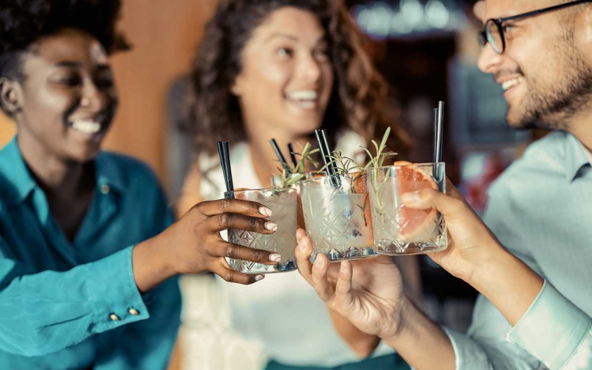 Residents enjoying their drinks near El Jardin Apartments in Hollywood, Florida
