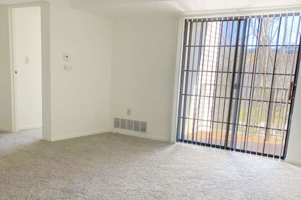 Apartment with vertical blinds at Carriage Court in Cincinnati, Ohio