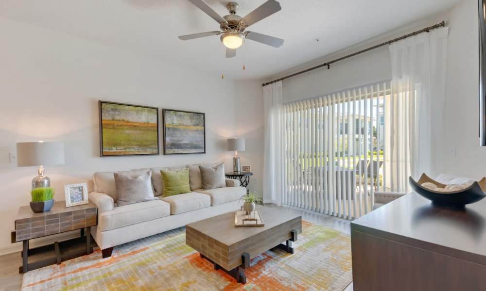 Spacious living room of an apartment at Champions Vue Apartments in Davenport, Florida