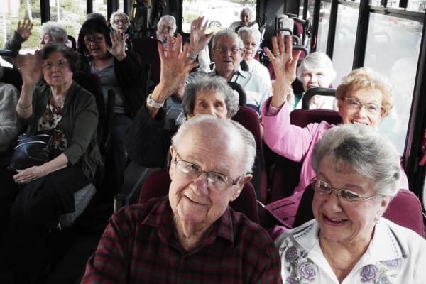 Residents on a bus going to an event near Merrill Gardens at Gilroy in Gilroy, California. 