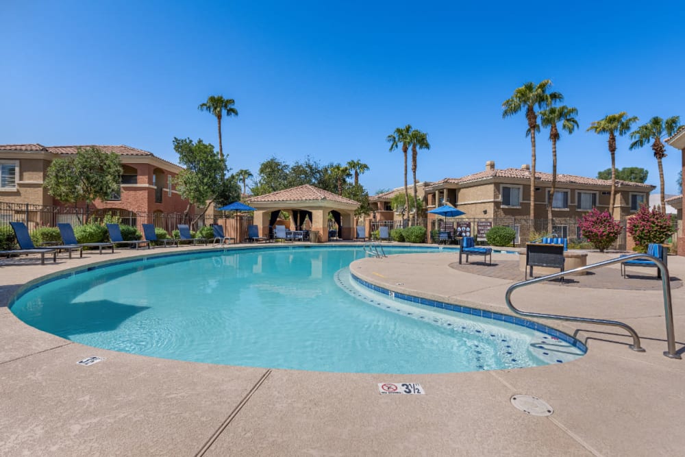 Swimming pool with gazebo and firepit area at Alante at the Islands in Chandler, Arizona