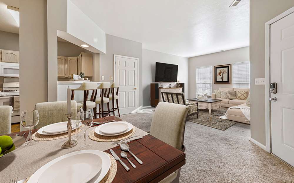 Spacious living room and dining area at Lake Pointe Apartment Homes in Portage, Indiana
