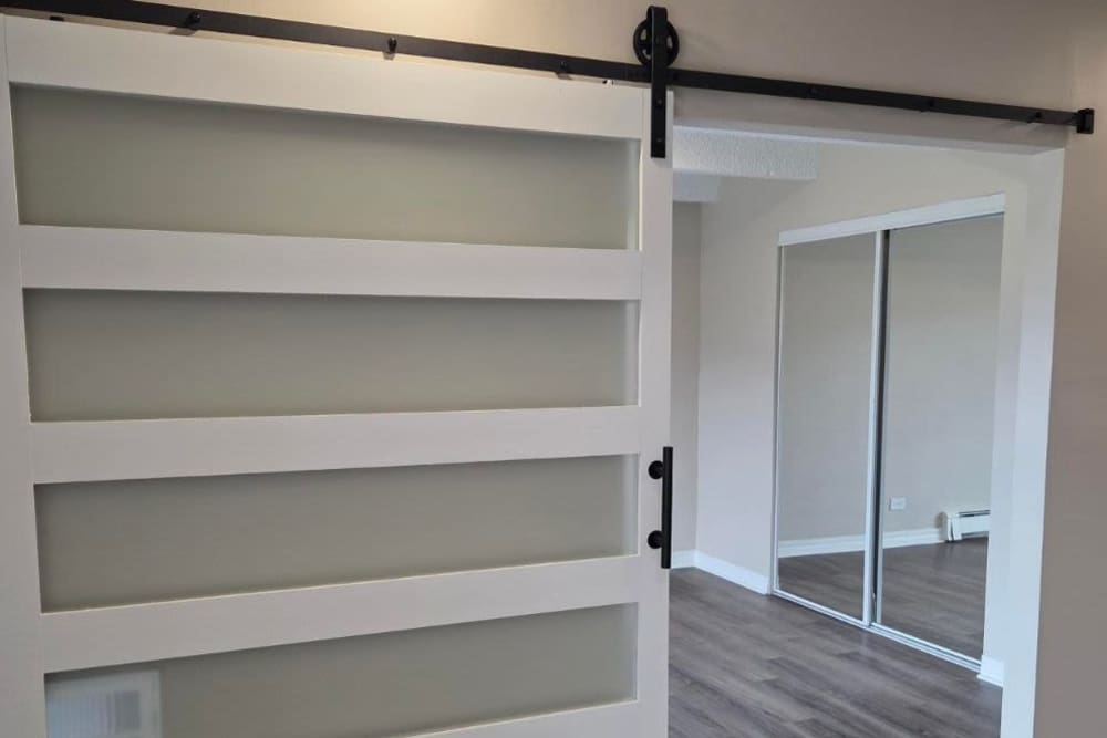 Sliding barn door into a one bedroom unit.