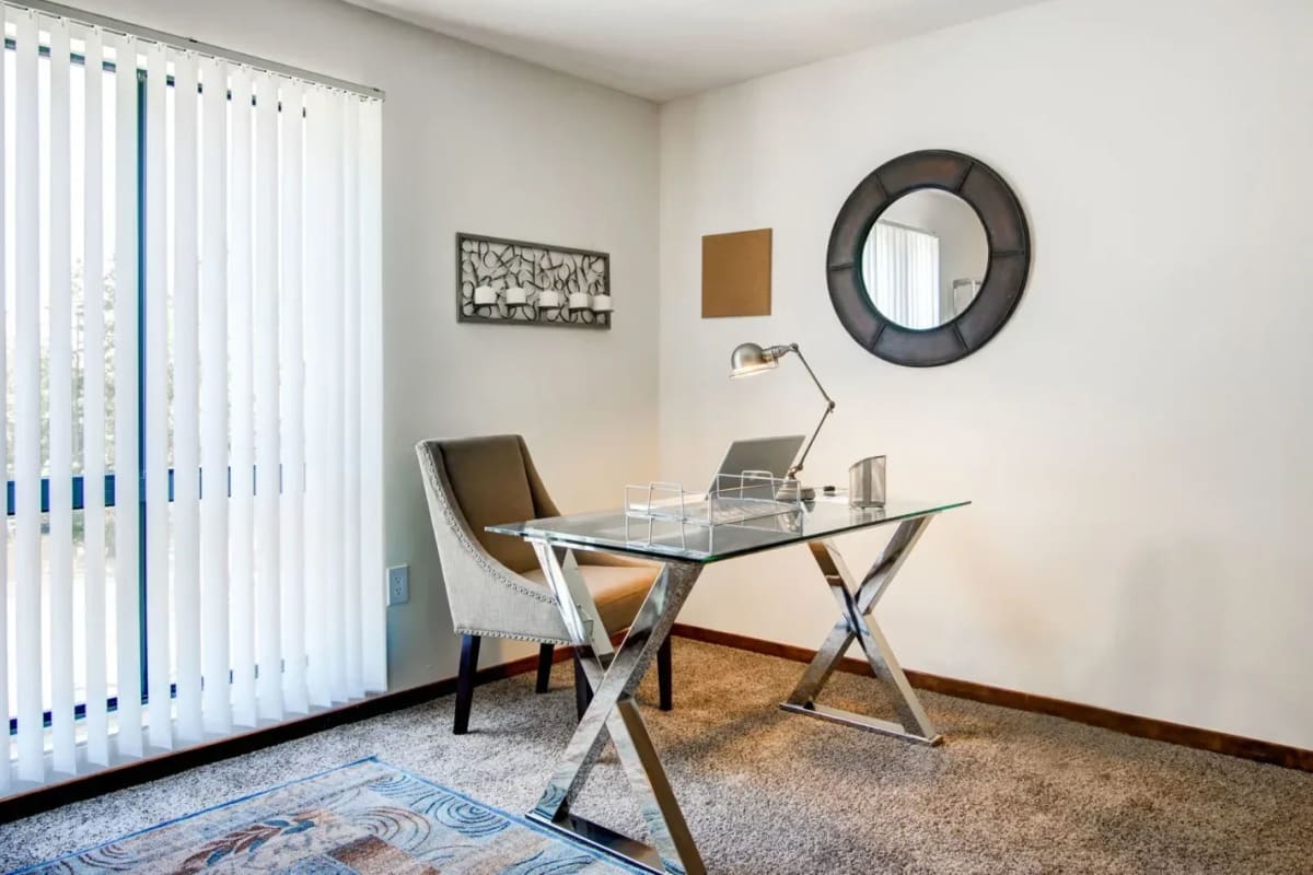 Desk in an apartment with a private balcony at Park At City West in Eden Prairie, Minnesota