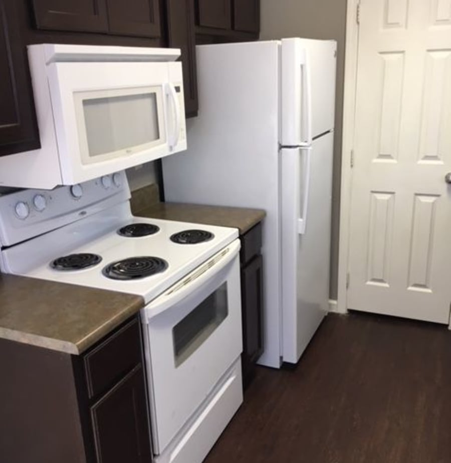 Kitchen at Harbin Pointe Apartments in Bentonville, Arkansas