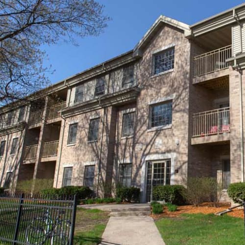 Building exterior and apartment entrances at Campus Properties in Ames, Iowa