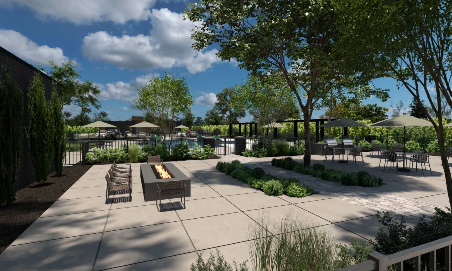Fire pit and outdoor lounge areas at MainLine Apartment Homes in Fredericksburg, Virginia Show more lines