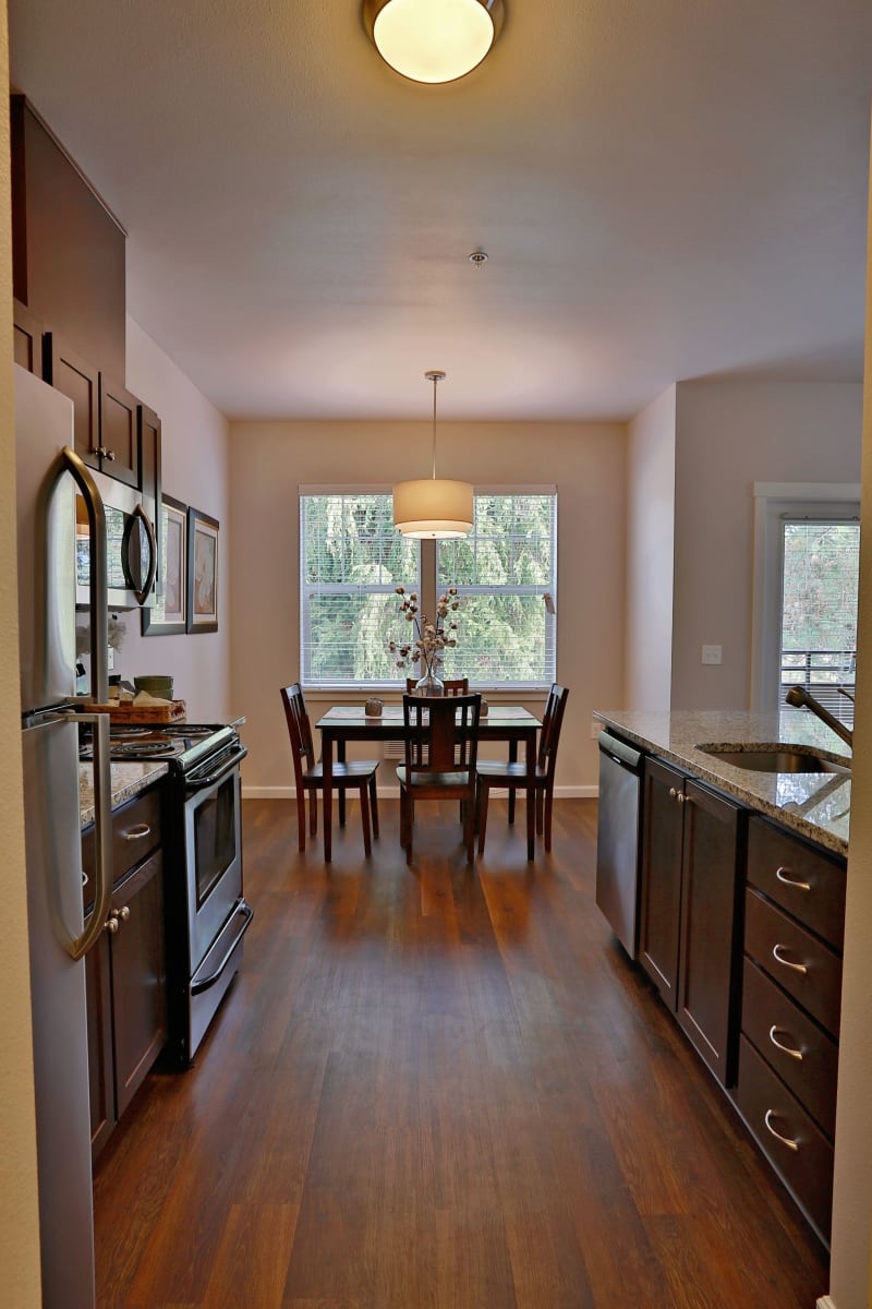 kitchen and dining at The Fairway Apartments in Salem, Oregon
