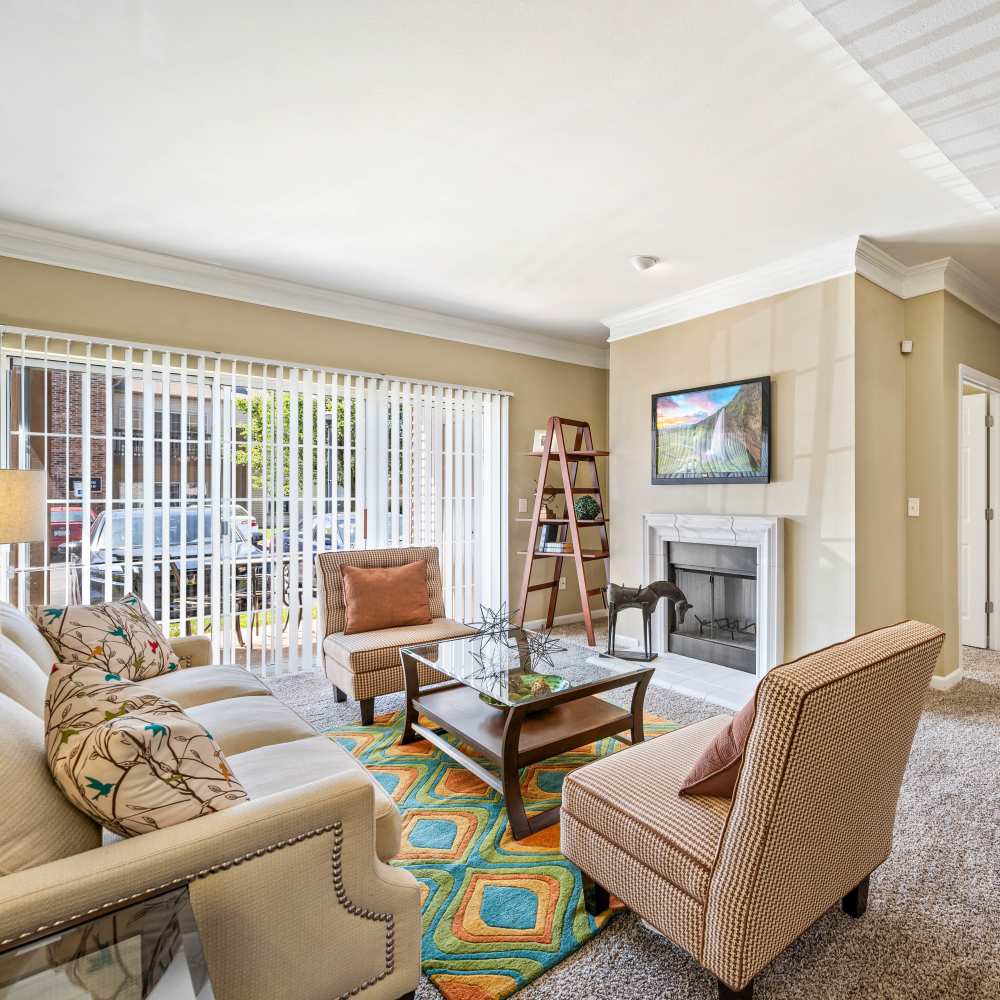 Bright living room at Prairie Point Luxury Apartments in O'Fallon. MO