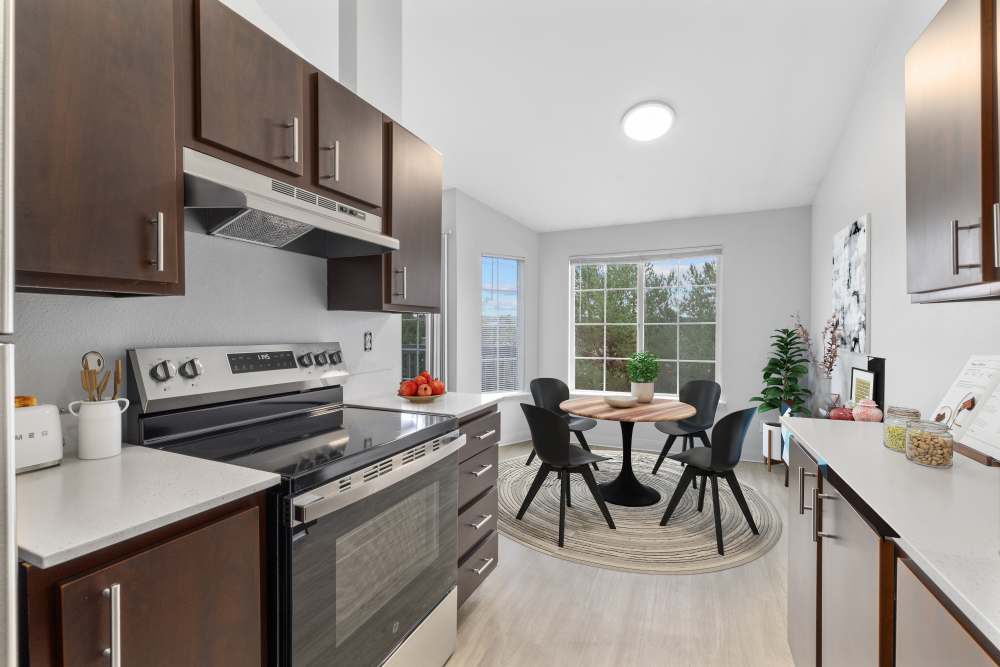 An updated kitchen with stylish cabinetry at Wellington Apartments in Silverdale, Washington