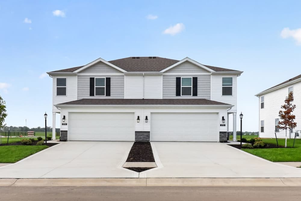 Two attached homes with driveways at Brixin Sonora in Fort Wayne, Indiana
