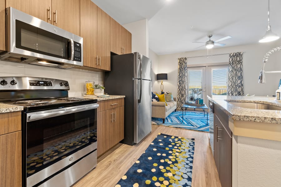 Kitchen with plenty of cabinetry at McCarty Commons in San Marcos, Texas