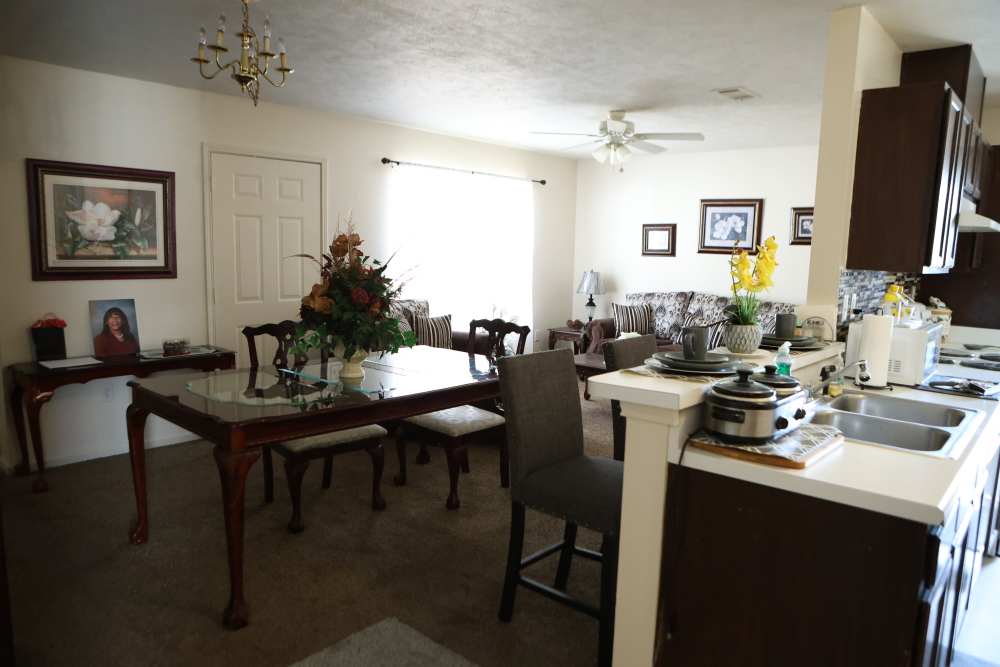 Kitchen with dining area at Arrington Estates of Clarksdale in Clarksdale, Mississippi