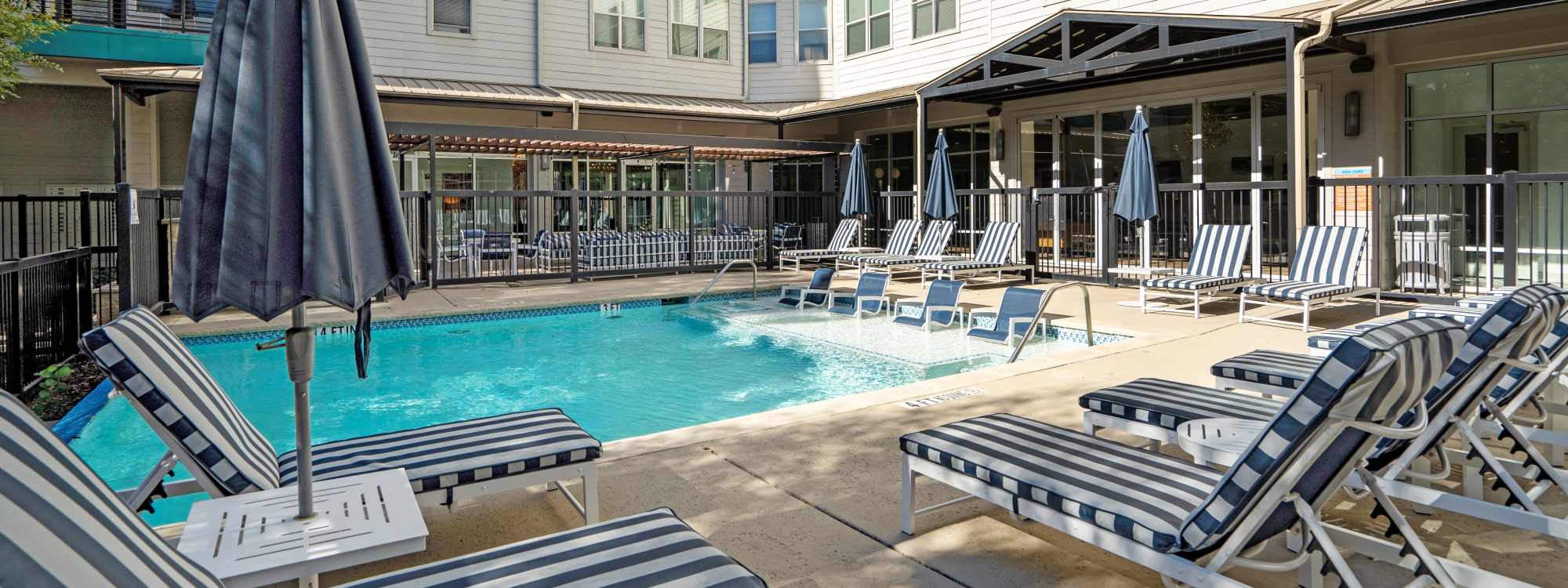 Outdoor swimming pool at The Lorimer in Denton, Texas