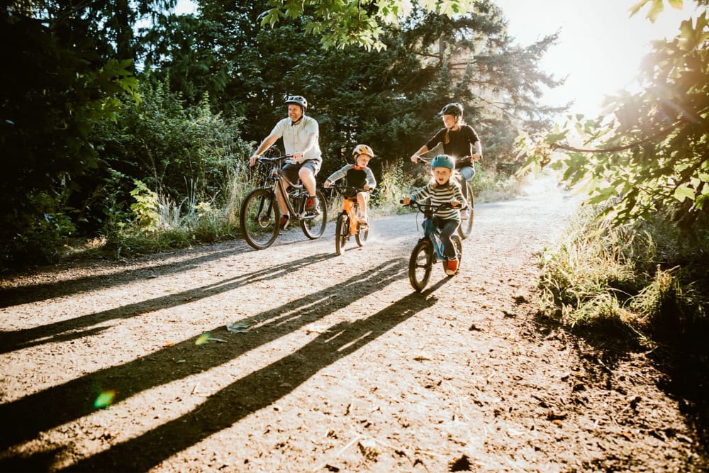 Family residents riding their bikes at a nearby park at FiveHigh in West Hartford, Connecticut