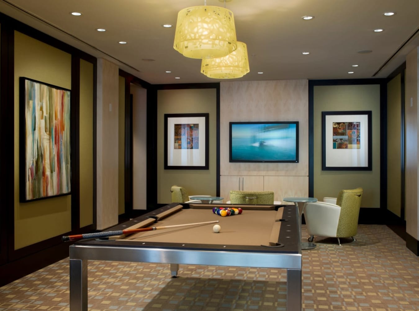 Game room with pool table at Solaire 1150 Ripley in Silver Spring, Maryland