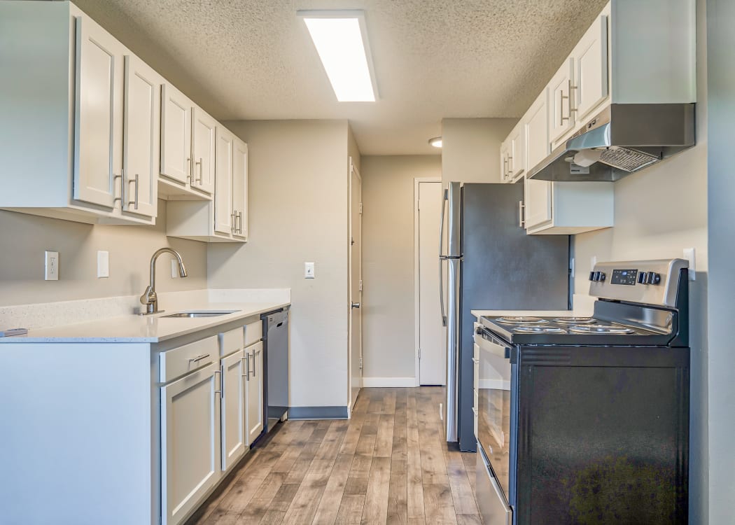 Kitchen with stainless-steel appliances at Courtyards at Cedar Hills in Beaverton, Oregon