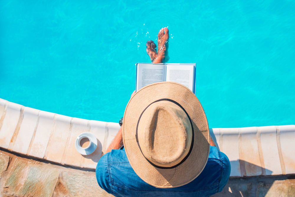 Residents enjoying the salt water pool at The Lofts at Whitaker Park in Winston-Salem, NC